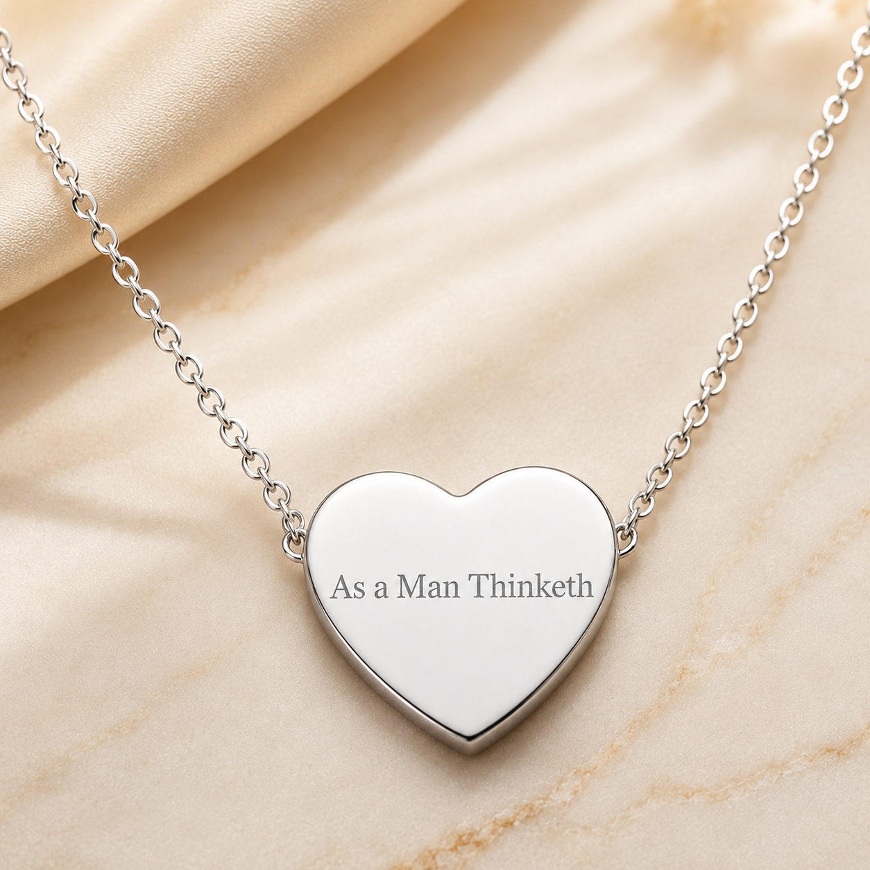 “As a Man Thinketh” Inspirational Engraved Stainless Steel Heart Necklace